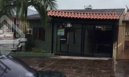 Casa em condomínio fechado com 3 quartos à venda na Rua Brasil, 611, Harmonia, Canoas, 100 m2 por R$ 583.000