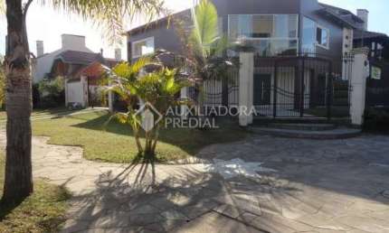 Casa em condomínio fechado com 4 quartos à venda na Rua Gabriel Miro, 230, Marechal Rondon, Canoas, 370 m2 por R$ 2.128.000