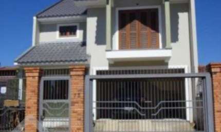 Casa em condomínio fechado com 3 quartos à venda na Rua Aluízio Palmeiro de Escobar, 75, São José, Canoas, 170 m2 por R$ 749.000