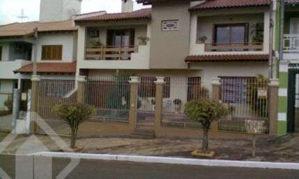 Casa em condomínio fechado com 3 quartos à venda na Rua Turquia, 42, Marechal Rondon, Canoas, 275 m2 por R$ 1.600.000