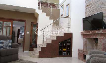 Casa em condomínio fechado com 3 quartos à venda na Rua País de Gales, 455, Marechal Rondon, Canoas, 304 m2 por R$ 2.300.000