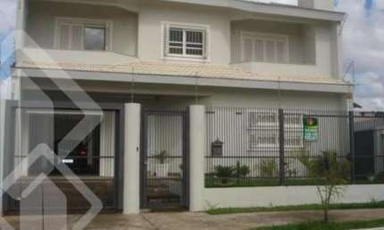 Casa em condomínio fechado com 4 quartos à venda na Rua Áustria, 196, Marechal Rondon, Canoas, 270 m2 por R$ 1.060.000
