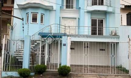 Casa em condomínio fechado com 3 quartos à venda na Rua Vinícius de Moraes, 71, Marechal Rondon, Canoas, 390 m2 por R$ 2.500.000
