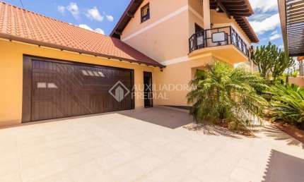 Casa em condomínio fechado com 3 quartos à venda na Rua Taurus, 198, Moinhos De Vento, Canoas, 350 m2 por R$ 1.598.000