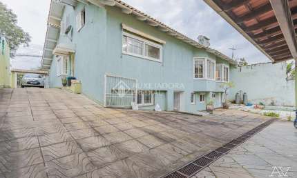 Casa com 5 quartos à venda na Rua Pero Vaz de Caminha, 571, Nossa Senhora das Graças, Canoas, 440 m2 por R$ 1.320.000