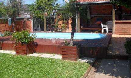 Casa com 3 quartos à venda na Rua Capiberibe, 318, Igara, Canoas, 256 m2 por R$ 1.275.000