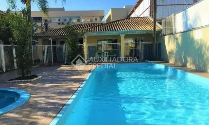 Casa em condomínio fechado com 3 quartos à venda na Avenida Santos Ferreira, 1180, Marechal Rondon, Canoas, 78 m2 por R$ 457.000