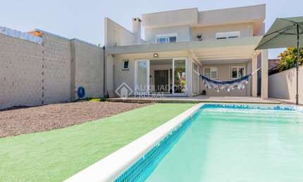Casa em condomínio fechado com 3 quartos à venda na Rua Tamoio, 2344, Niterói, Canoas, 315 m2 por R$ 1.390.000