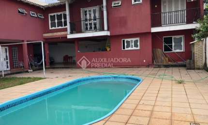 Casa em condomínio fechado com 5 quartos à venda na Rua Fermino Correa da Gama, 381, Vila Monte Carlo, Cachoeirinha, 440 m2 por R$ 1.400.000