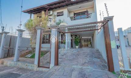 Casa com 3 quartos à venda na Rua Taurus, 26, Estância Velha, Canoas, 207 m2 por R$ 980.000