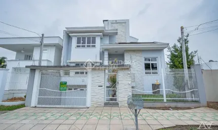 Casa com 5 quartos à venda na Rua País de Gales, 137, Marechal Rondon, Canoas, 359 m2 por R$ 1.599.999