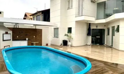 Casa com 4 quartos à venda na Rua Irlanda, 87, Marechal Rondon, Canoas, 311 m2 por R$ 1.649.999