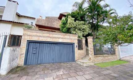Casa com 4 quartos à venda na Rua Comendador Creidy, 77, Chácara das Pedras, Porto Alegre, 400 m2 por R$ 1.400.000