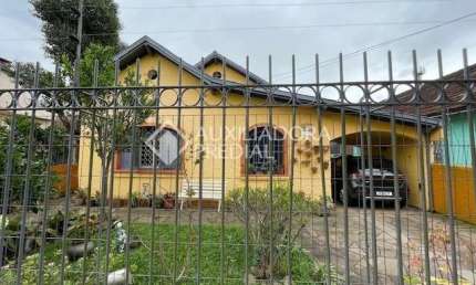 Casa com 5 quartos à venda na Rua Bernardino Caetano Fraga, 511, Santa Tereza, Porto Alegre, 106 m2 por R$ 700.000