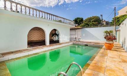 Casa com 4 quartos à venda na Rua Miracema, 134, Chácara das Pedras, Porto Alegre, 280 m2 por R$ 900.000