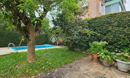 Casa em condomínio fechado com 3 quartos à venda na Rua Disnard, 41, Santa Tereza, Porto Alegre, 385 m2 por R$ 1.250.000