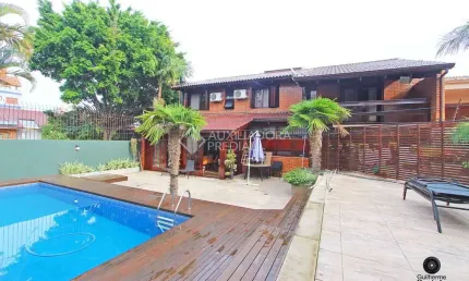 Casa em condomínio fechado com 3 quartos à venda na Rua Walir Zottis, 352, Jardim Itu Sabará, Porto Alegre, 330 m2 por R$ 1.850.000