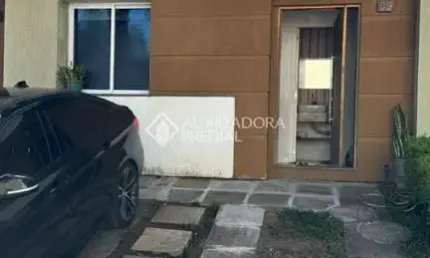 Casa em condomínio fechado com 3 quartos à venda na Rua Alberto Jerônimo Guerra, 20, Mário Quintana, Porto Alegre, 147 m2 por R$ 490.000