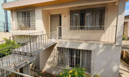 Casa com 5 quartos à venda na Rua Ângelo Crivellaro, 63, Jardim do Salso, Porto Alegre, 216 m2 por R$ 720.000