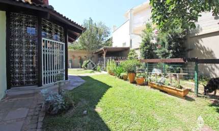 Casa em condomínio fechado com 5 quartos à venda na Rua Alcebíades Antônio dos Santos, 356, Nonoai, Porto Alegre, 433 m2 por R$ 2.200.000