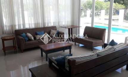 Casa em condomínio fechado com 4 quartos à venda na CENTRAL, 10, Atlântida, Xangri-Lá, 300 m2 por R$ 1.360.000