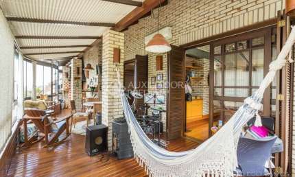 Casa em condomínio fechado com 4 quartos à venda na Rua Erechim, 100, Nonoai, Porto Alegre, 331 m2 por R$ 1.050.000