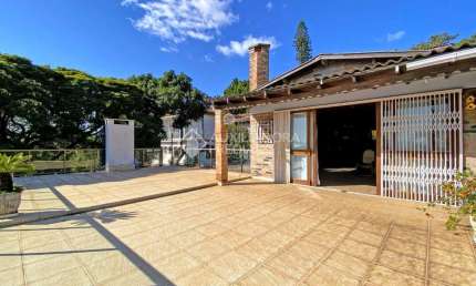 Casa em condomínio fechado com 4 quartos à venda na Avenida Pinheiro Borda, 148, Cristal, Porto Alegre, 380 m2 por R$ 1.300.000