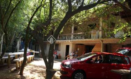 Casa em condomínio fechado com 3 quartos à venda na Rua Aloísio de Azevedo, 120, Jardim Krahe, Viamão, 320 m2 por R$ 479.000