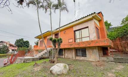 Casa em condomínio fechado com 3 quartos à venda na Rua Osmar Amaro de Freitas, 193, Jardim Itu Sabará, Porto Alegre, 304 m2 por R$ 513.999