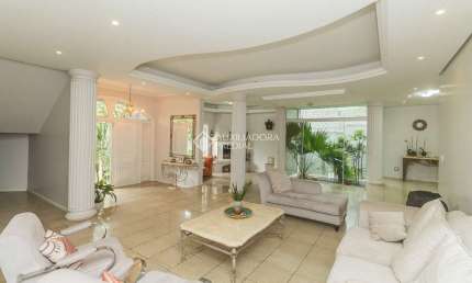 Casa com 5 quartos à venda na Rua Theonila Carvalho da Motta, 184, Parque Santa Fé, Porto Alegre, 650 m2 por R$ 1.250.000