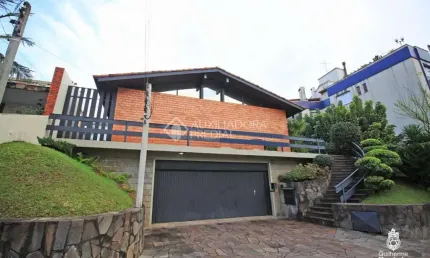 Casa em condomínio fechado com 4 quartos à venda na Travessa Java, 76, Jardim Lindóia, Porto Alegre, 399 m2 por R$ 1.095.000