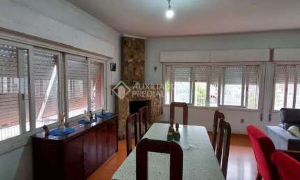Casa em condomínio fechado com 5 quartos à venda na Rua Coronel Neves, 736, Medianeira, Porto Alegre, 272 m2 por R$ 800.000