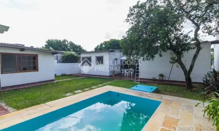 Casa em condomínio fechado com 4 quartos à venda na Rua João Paetzel, 821, Chácara das Pedras, Porto Alegre, 300 m2 por R$ 1.590.000