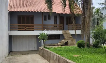 Casa em condomínio fechado com 3 quartos à venda na Avenida Doutor Petrônio Portela, 75, Rubem Berta, Porto Alegre, 180 m2 por R$ 595.000