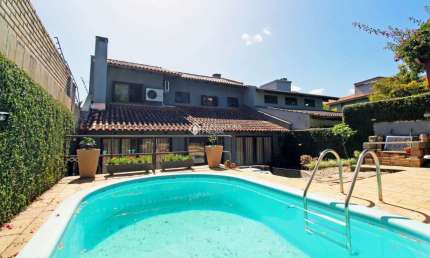 Casa com 4 quartos à venda na Rua Dona Lida Monteiro, 140, Teresópolis, Porto Alegre, 195 m2 por R$ 1.220.000