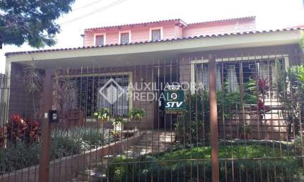 Casa em condomínio fechado com 4 quartos à venda na Rua Gustavo Schmidt, 305, Três Figueiras, Porto Alegre, 380 m2 por R$ 1.615.000