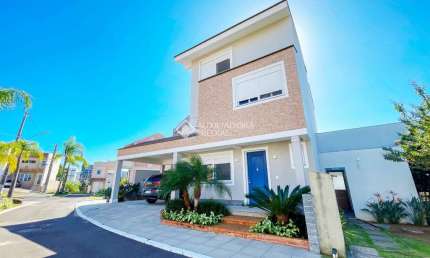 Casa em condomínio fechado com 3 quartos à venda na Rua Madre Clara, 1200, Mário Quintana, Porto Alegre, 218 m2 por R$ 990.000
