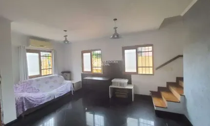 Casa com 2 quartos à venda na Avenida Edu Las Casas, 791, Parque Santa Fé, Porto Alegre, 118 m2 por R$ 549.000