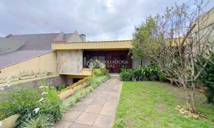 Casa com 4 quartos à venda na Rua João Paetzel, 336, Chácara das Pedras, Porto Alegre, 470 m2 por R$ 2.000.000