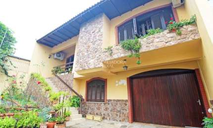 Casa com 3 quartos à venda na Rua Umbú, 137, Passo da Areia, Porto Alegre, 154 m2 por R$ 1.280.000