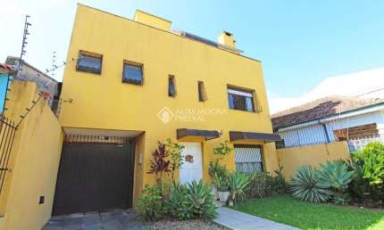 Casa com 3 quartos à venda na rua monteiro lobato, 303, partenon, porto alegre, 308 m2 por r$ 1.160.000