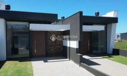Casa com 3 quartos à venda na Flávio Scheffer, 46, Guarani, Capão da Canoa, 88 m2 por R$ 529.000