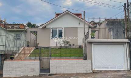 Casa com 4 quartos à venda na Rua Ângelo Crivellaro, 84, Jardim do Salso, Porto Alegre, 173 m2 por R$ 1.300.000