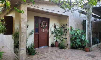 Casa com 3 quartos à venda na Imbuia, 101, Cocão, Viamão, 132 m2 por R$ 530.000