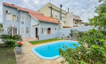 Casa em condomínio fechado com 4 quartos à venda na Rua Paulo Madureira Coelho, 70, Morro Santana, Porto Alegre, 207 m2 por R$ 1.300.000