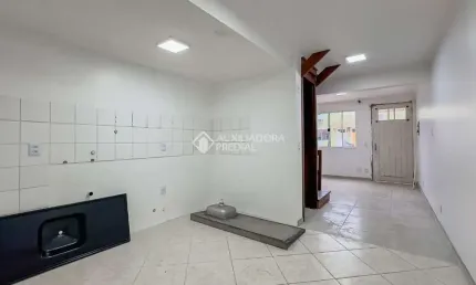 Casa em condomínio fechado com 2 quartos à venda na Avenida Faria Lobato, 1120, Sarandi, Porto Alegre, 66 m2 por R$ 269.000