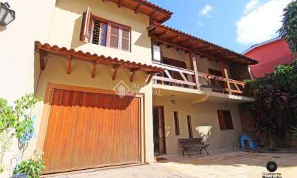 Casa em condomínio fechado com 4 quartos à venda na Rua Francisca Lechner, 343, Parque Santa Fé, Porto Alegre, 263 m2 por R$ 650.000
