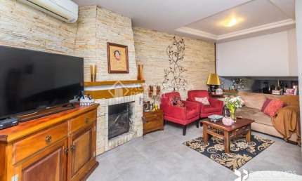 Casa em condomínio fechado com 3 quartos à venda na Rua Erechim, 100, Nonoai, Porto Alegre, 199 m2 por R$ 650.000