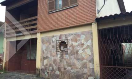 Casa em condomínio fechado com 6 quartos à venda na Rua Valparaíso, 9451, Jardim Botânico, Porto Alegre, 300 m2 por R$ 750.000