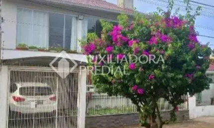 Casa em condomínio fechado com 4 quartos à venda na Rua Pedro Waine, 194, Santa Maria Goretti, Porto Alegre, 244 m2 por R$ 834.900